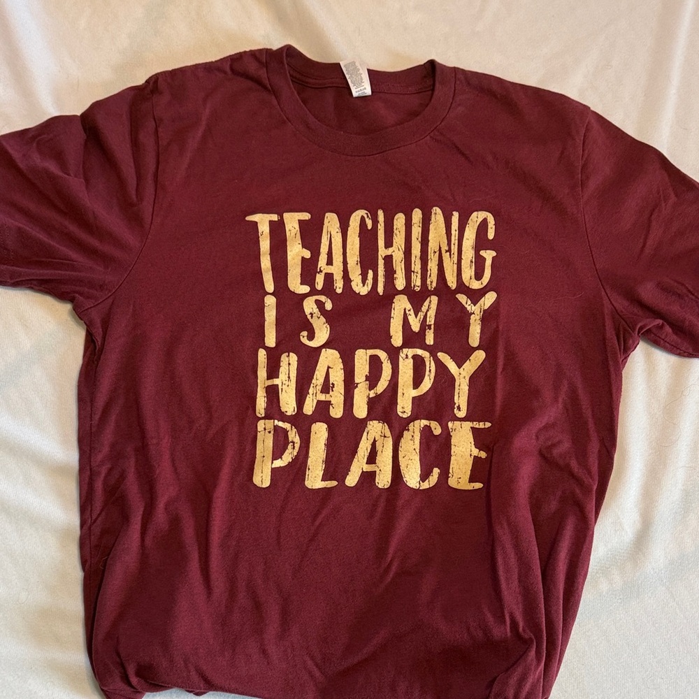 Bella Canvas maroon t shirt with tan silk screened letters